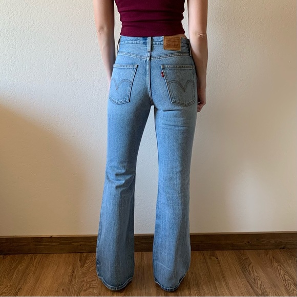 Levis Strauss Ripped High Rise Boot Cut Jeans Medium Wash Size 25 - Picture 3 of 11